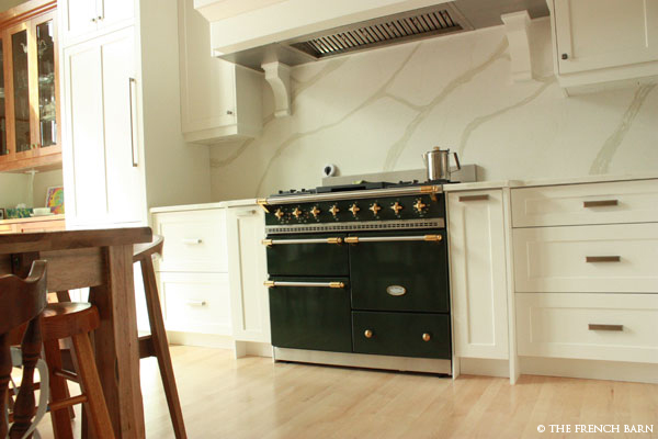 Hardwood floors with green stove