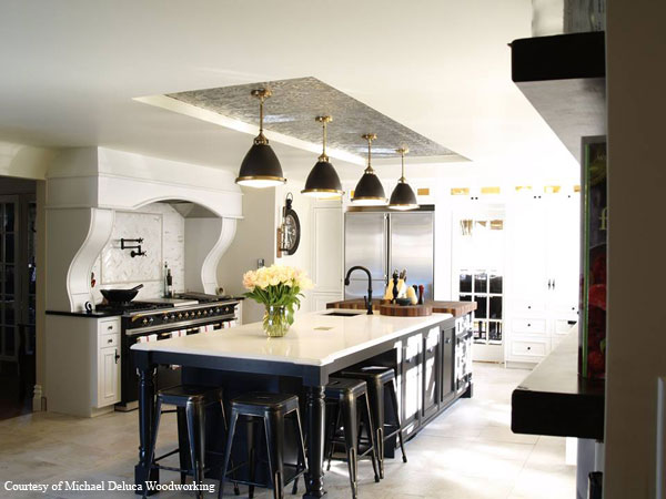 Large kitchen with Black and Brass chandeliers